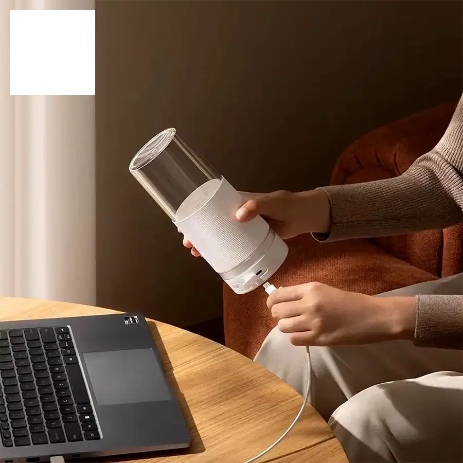 آبمیوه گیری قابل حمل شیائومی مدل Mijia Cup Shape Juicer 2، تصویر ۲